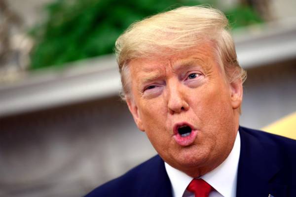 $!US President Donald Trump speaks during a meeting with the president of the Republic of Ecuador at the White House in Washington, DC, on February 12, 2020. (Photo by JIM WATSON / AFP)